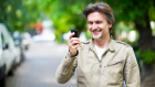 IS Request a song or mention - man on phone middle aged.jpg