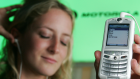 PA Listen on mobile - woman listening mobile phone.jpg