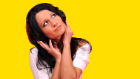 woman listening headphones yellow.jpg