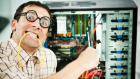 Geek fixing a computer.jpg