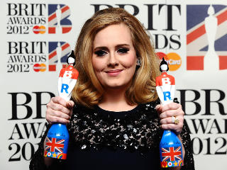 PA - Adele wins two BRIT Awards. British Female Solo Artist and British Album Of The Year for 21