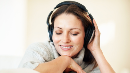 IS Simon Bates Our Tune - woman listening headphones.jpg IS Simon Bates Our Tune - woman listening headphones.jpg