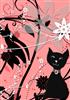 little black cat among the flowers