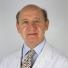 Dr. Alfonso Martínez de Carneros Gómez Caminero