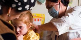 MSF doctor treats child MSF doctor treats child