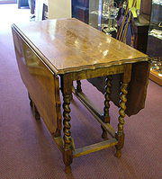 Golden oak gateleg table from