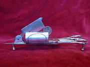 silverplated antique candle snuffer