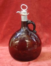 antique spirit decanter with silver collar