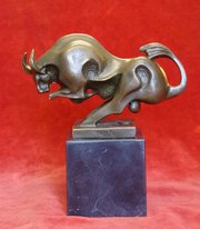 bronze bull on marble plinth