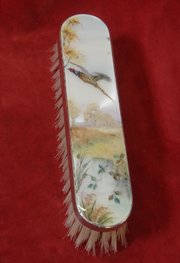 silver brush with enamelled back c1962