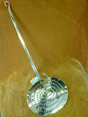 antique brass milk skimmer