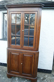 oak glazed corner cupboard