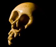 A CARVED IVORY MOMENTO MORI SK