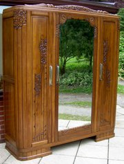 A French Carved mahogany wardr