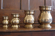 Setof four brass tankards