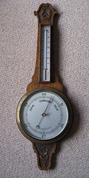 carved oak aneroid barometer