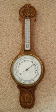 carved oak aneroid barometer