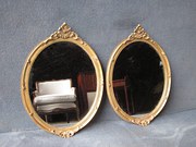 PAIR OF OVAL GILT MIRRORS