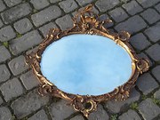 Antique oval gilt wall mirror