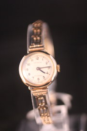 Ladies 9k gold cocktail watch