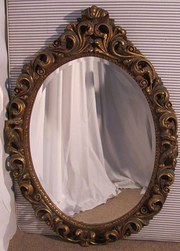 A Large Decorative Carved Oval