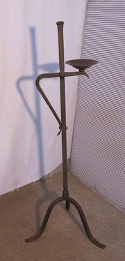 A Large Gothic Iron Candle Sti