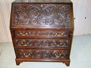 A Victorian Gothic Carved Oak