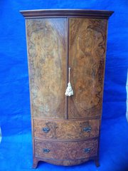A small Burr Walnut Bowed Ward