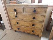 Decorated pine chest of drawer