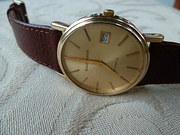 BUECHE GIROD...Gold wrist watch.