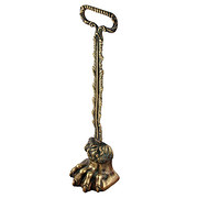 A Late Regency Brass Door Stop