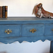 A decorative painted Dresser b