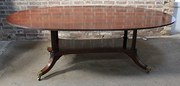 Oval mahogany dining table