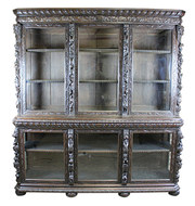 Very large carved oak glazed b