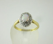 Lovely Opal and Diamond Ring