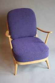 Low backed armchair by Ercolan