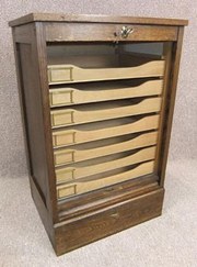Tambour fronted oak cabinet