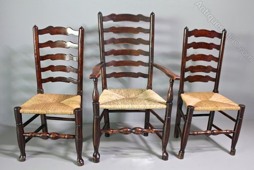 Set of 12 Lancashire Wavy Ladderback Chairs.