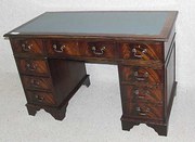 desk with blue leather top