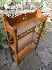 Arts & Crafts Bookshelves with pierced gallery