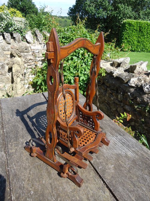Arts & Crafts Dolls Swing with caned seat.