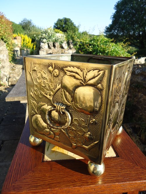Arts & Crafts brass planter with lead liner