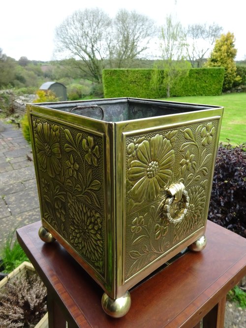 Arts & Crafts brass planter with lead liner