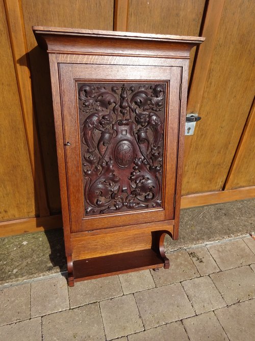 Arts & Crafts carved Gothic wall cupboard