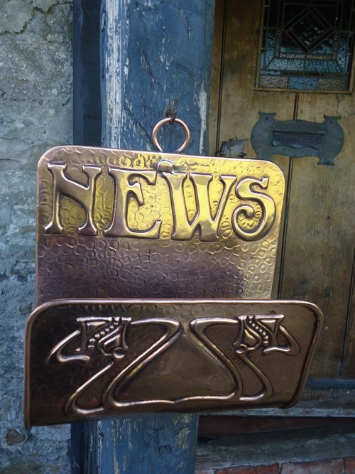 Arts & Crafts copper Newlyn school news holder