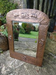 Arts & Crafts copper floral mirror