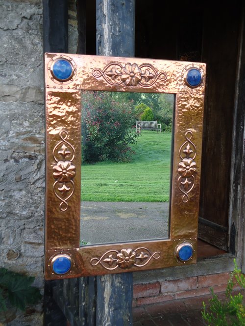 Arts & Crafts copper mirror with cabochons