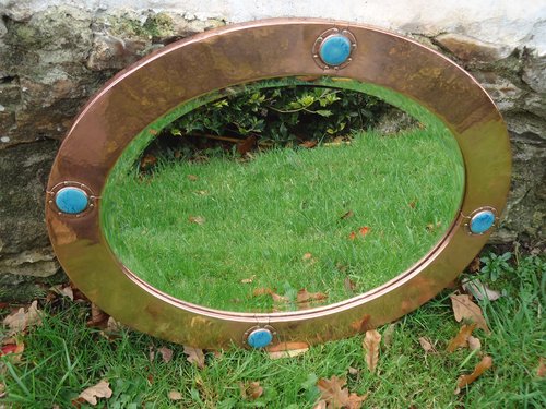 Arts & Crafts copper mirror with Ruskin. Liberty