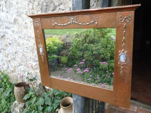 Arts & Crafts copper mirror with with ceramic plaques