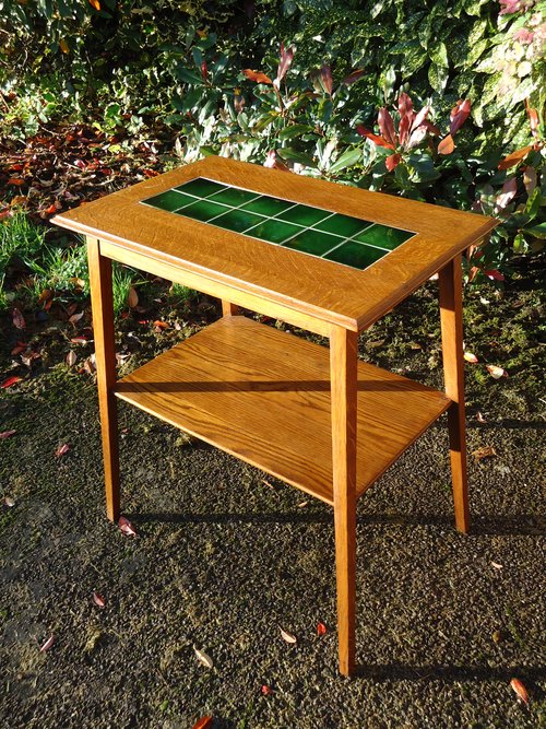 Arts & Crafts green tiled top table by Liberty